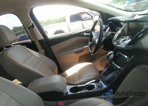 2015 Ford Escape Titanium z USA, uszkodzony, nr VIN 1FMCU0JX7FUC85628